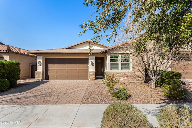 view of front of property featuring a garage