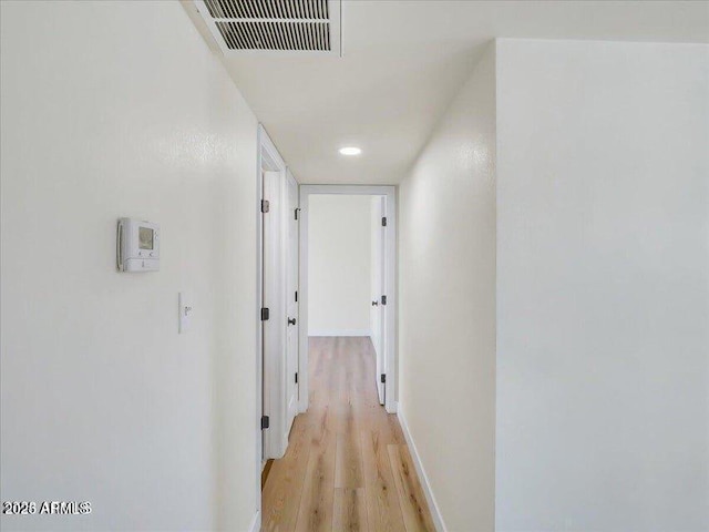 3650 E Laurel Ln, Phoenix, AZ 85028 - corridor featuring light wood finished floors and baseboards