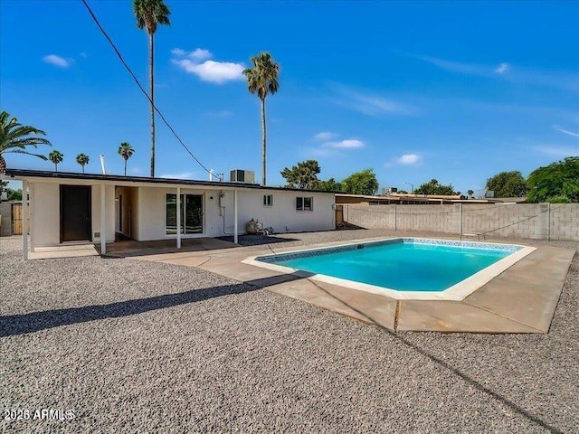 3650 E Laurel Ln, Phoenix, AZ 85028 - view of pool with a fenced backyard, a patio, and central AC