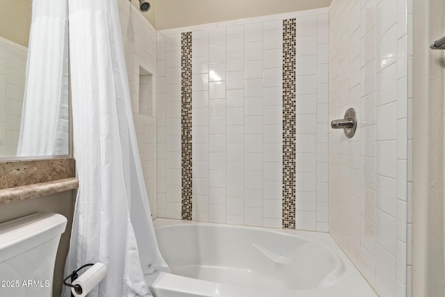 bathroom with shower / bath combination with curtain and toilet