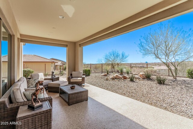 view of patio with a fenced backyard and outdoor lounge area