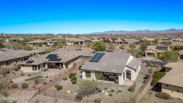 drone / aerial view with a mountain view and a residential view