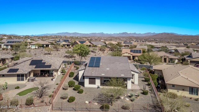 aerial view with a mountain view and a residential view