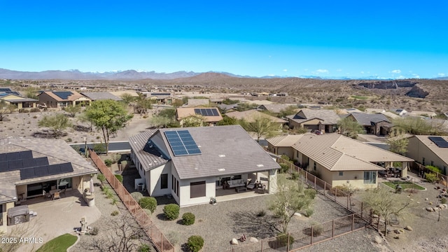 birds eye view of property featuring a residential view and a mountain view