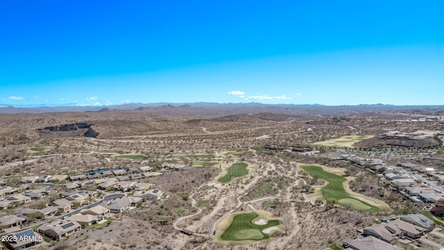 bird's eye view with view of golf course, a mountain view, and a residential view