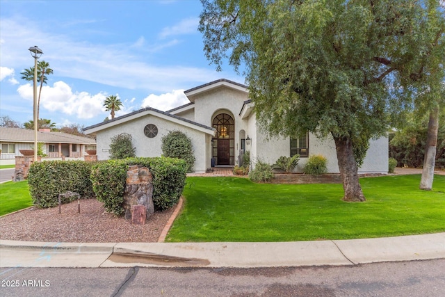 view of front of property with a front lawn