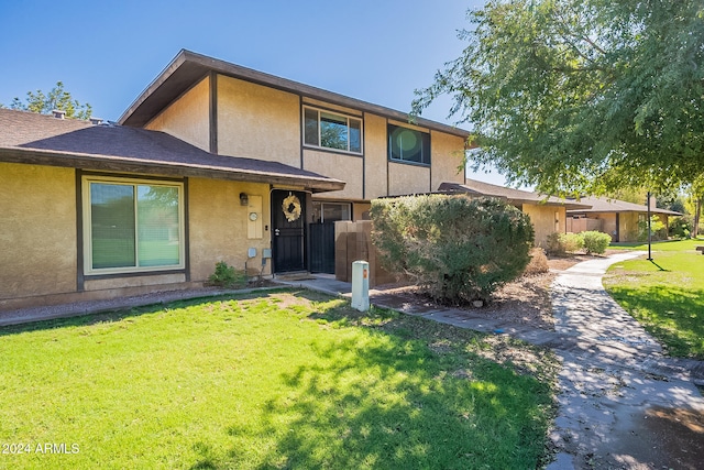 view of front of house with a front yard