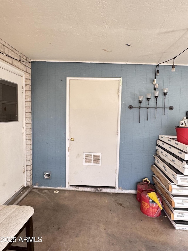 doorway to property with visible vents