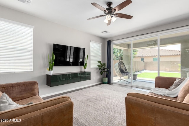 2562 N Springfield St, Buckeye, AZ 85396 - living area with ceiling fan and baseboards