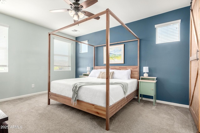 2562 N Springfield St, Buckeye, AZ 85396 - carpeted bedroom featuring ceiling fan and baseboards
