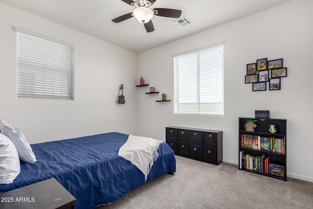 2562 N Springfield St, Buckeye, AZ 85396 - carpeted bedroom featuring baseboards and ceiling fan