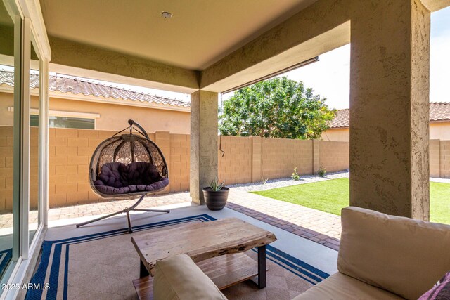 2562 N Springfield St, Buckeye, AZ 85396 - fenced backyard featuring a patio area