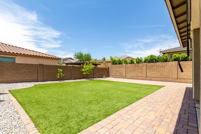 2562 N Springfield St, Buckeye, AZ 85396 - view of yard with a patio