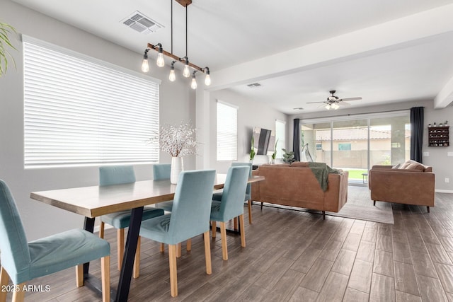 2562 N Springfield St, Buckeye, AZ 85396 - dining space with dark wood-type flooring and ceiling fan