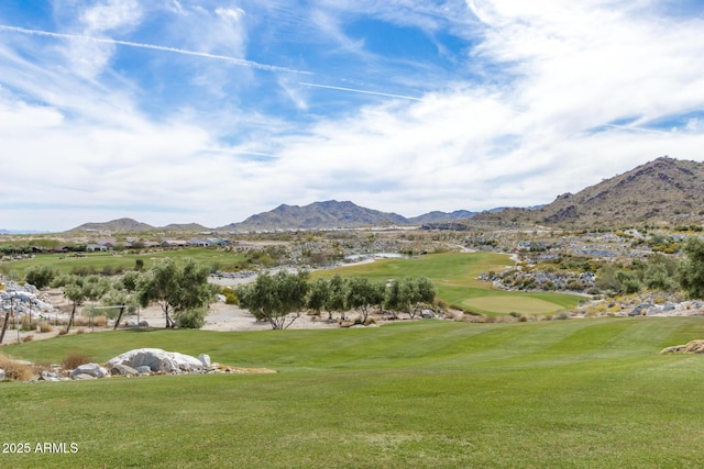 2562 N Springfield St, Buckeye, AZ 85396 - view of home's community with golf course view, a mountain view, and a yard