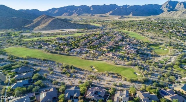 2562 N Springfield St, Buckeye, AZ 85396 - aerial view of property and surrounding area with a mountainous background, nearby suburban area, and a golf course