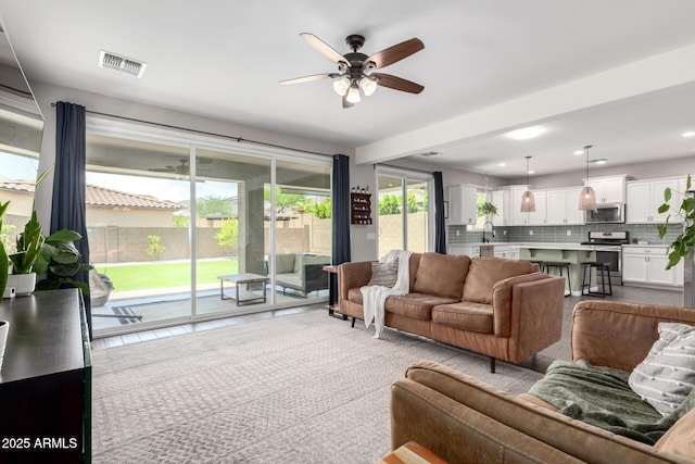 2562 N Springfield St, Buckeye, AZ 85396 - living room with ceiling fan