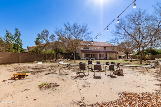 rear view of property featuring a patio