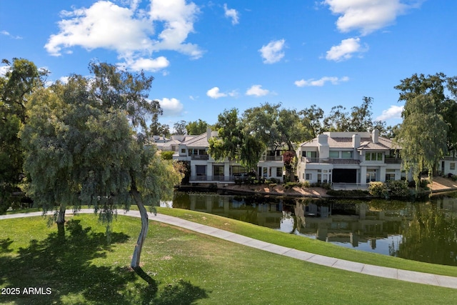 7272 E Gainey Ranch Rd Unit 29, Scottsdale, AZ 85258 - view of property's community featuring a water view and a yard
