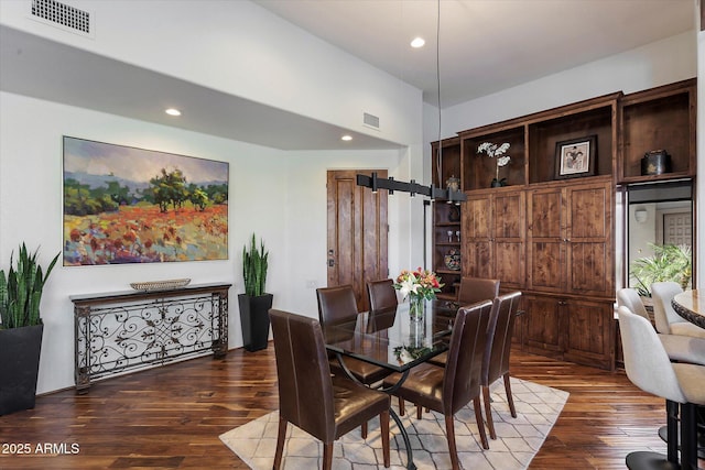 7272 E Gainey Ranch Rd Unit 29, Scottsdale, AZ 85258 - dining area featuring wood finished floors and recessed lighting