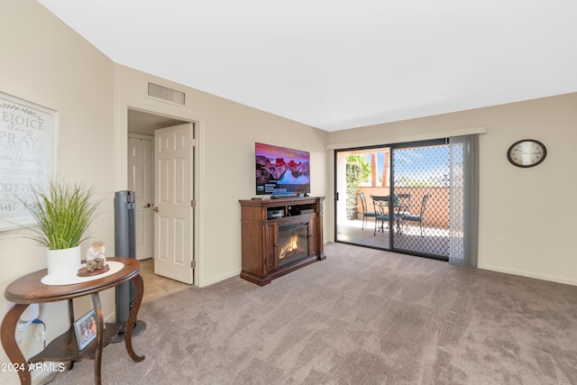 living room featuring light colored carpet