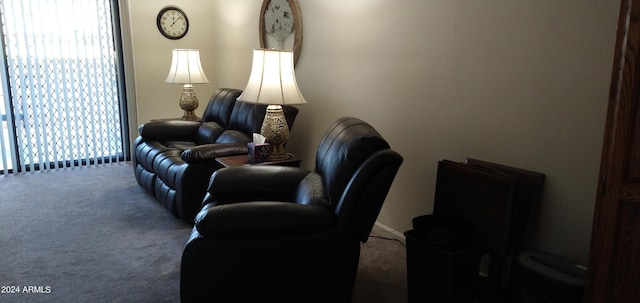 17404 N 99th Ave Unit 108, Sun City, AZ 85373 - living room featuring carpet flooring and healthy amount of natural light