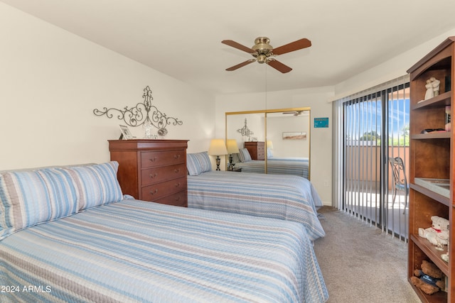 bedroom with a closet, ceiling fan, light carpet, and access to outside