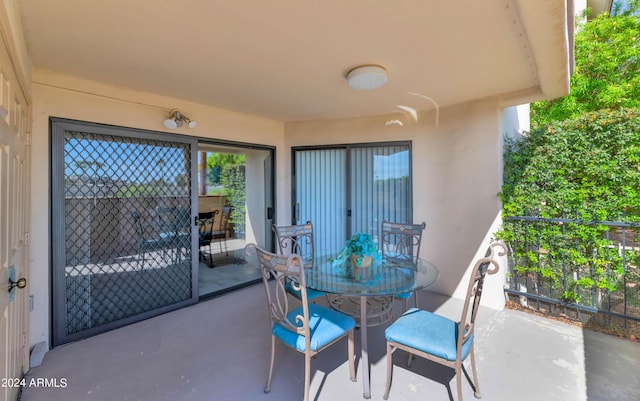 17404 N 99th Ave Unit 108, Sun City, AZ 85373 - view of patio with a balcony