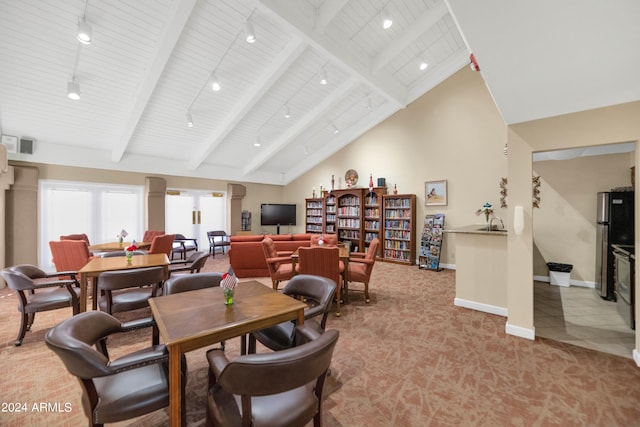 carpeted dining space with sink, wood ceiling, beamed ceiling, high vaulted ceiling, and track lighting