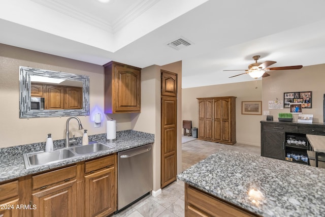 kitchen with ceiling fan, appliances with stainless steel finishes, stone counters, crown molding, and sink