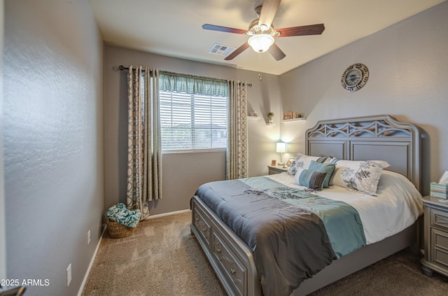 carpeted bedroom featuring baseboards, ceiling fan, and visible vents