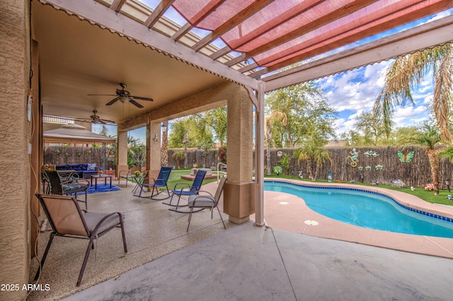 view of swimming pool with a patio, a ceiling fan, a fenced backyard, and a pergola