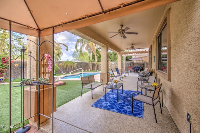 view of patio with a fenced in pool, a fenced backyard, a gazebo, and a ceiling fan