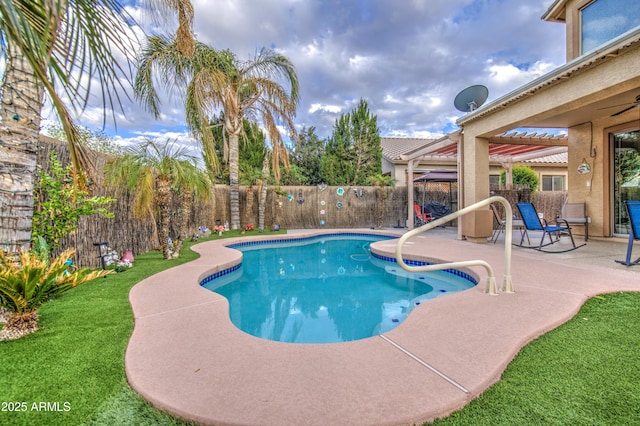 view of pool featuring a patio, a fenced in pool, a fenced backyard, and a lawn