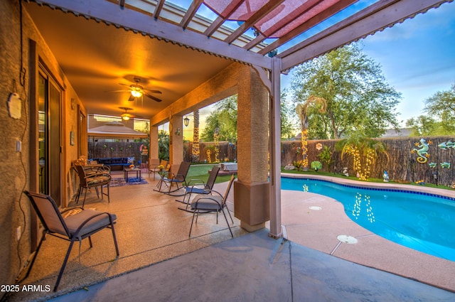 view of pool with an outdoor hangout area, a patio, a fenced backyard, a fenced in pool, and a pergola
