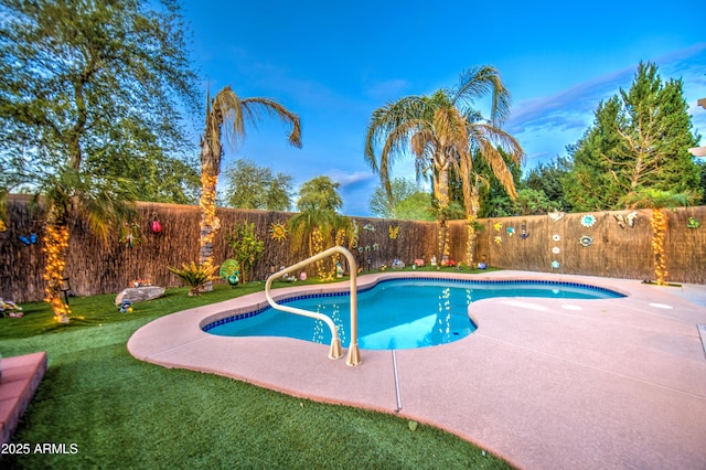 view of pool featuring a fenced backyard, a fenced in pool, and a lawn