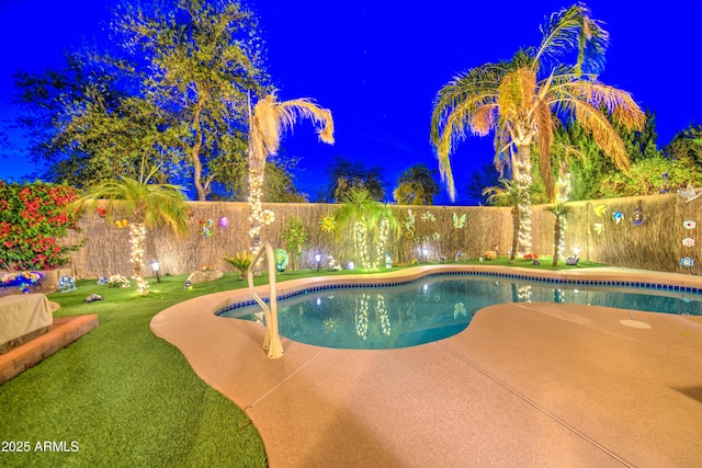 view of swimming pool featuring a fenced backyard, a patio, and a fenced in pool