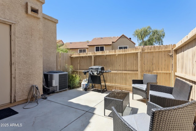 4601 N 102nd Ave Unit 1055, Phoenix, AZ 85037 - fenced backyard with central AC unit, grilling area, and a patio