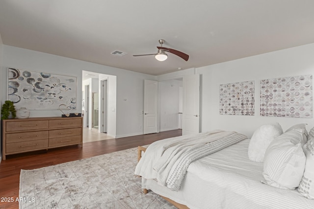 bedroom with hardwood / wood-style floors and ceiling fan