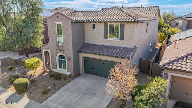 view of front of property with a garage