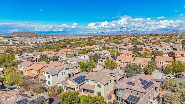 birds eye view of property featuring a mountain view