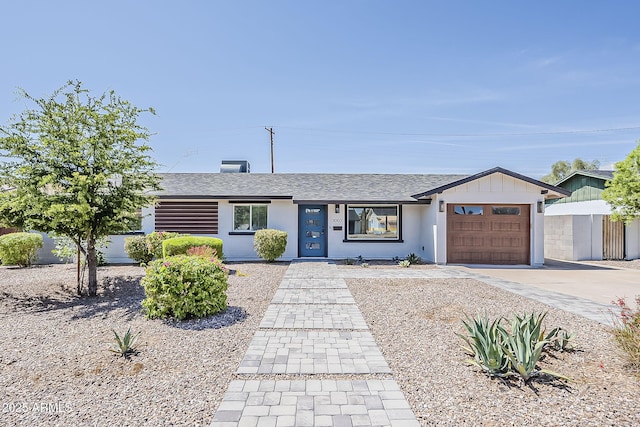 1003 E Marigold Ln, Tempe, AZ 85288 - ranch-style house featuring a garage, roof with shingles, and concrete driveway