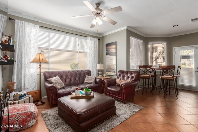 tiled living room featuring ornamental molding and ceiling fan