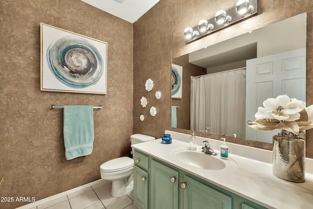 full bathroom with vanity, tile patterned floors, and toilet