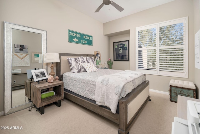 bedroom featuring ceiling fan and light carpet