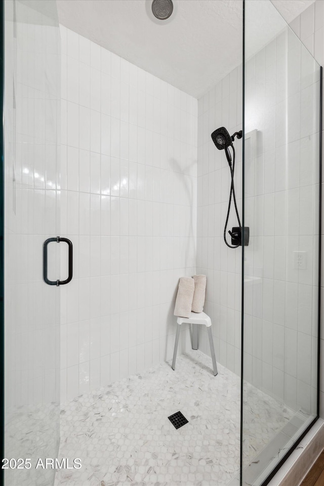 full bathroom with a stall shower