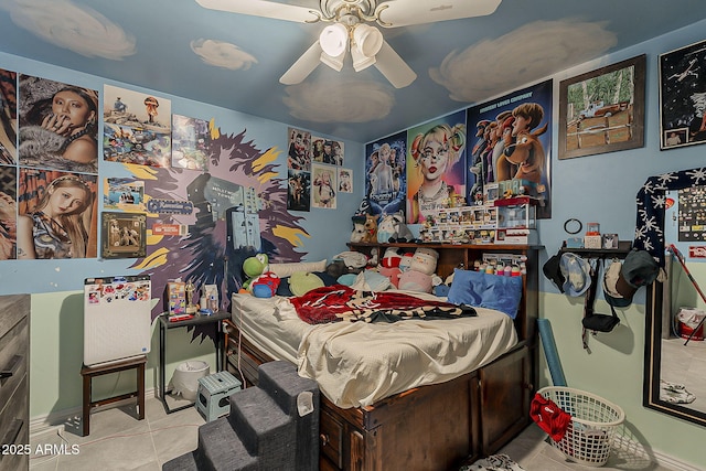 tiled bedroom with ceiling fan