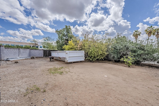 view of yard with fence