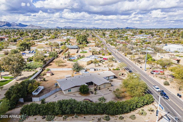 aerial view with a mountain view and a residential view