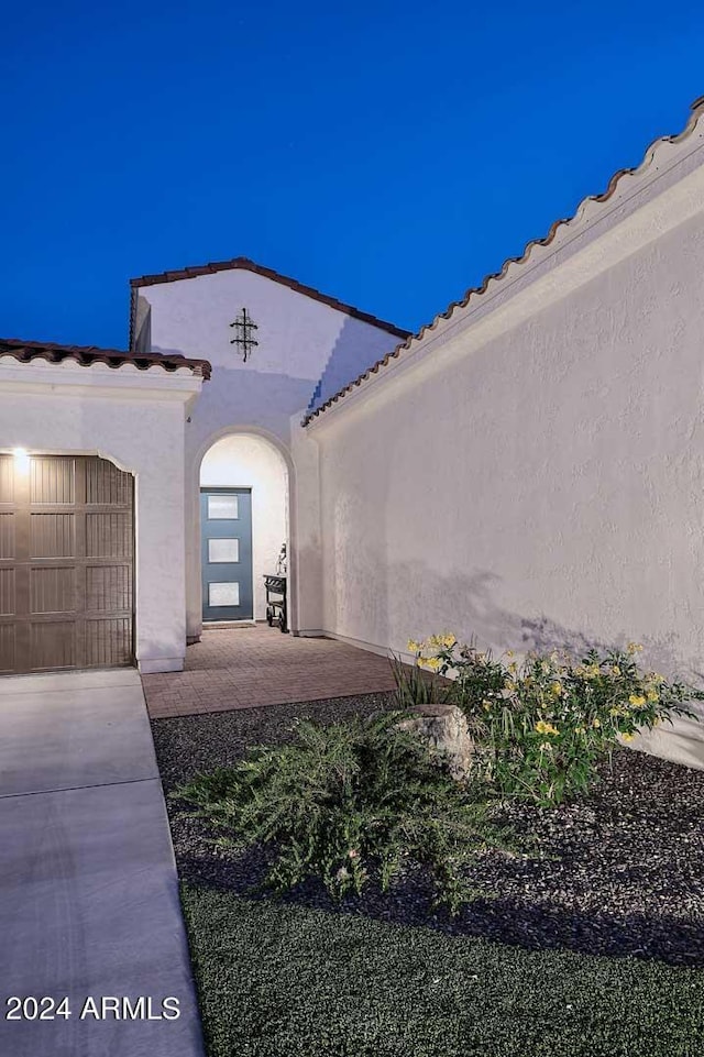 property entrance featuring a garage